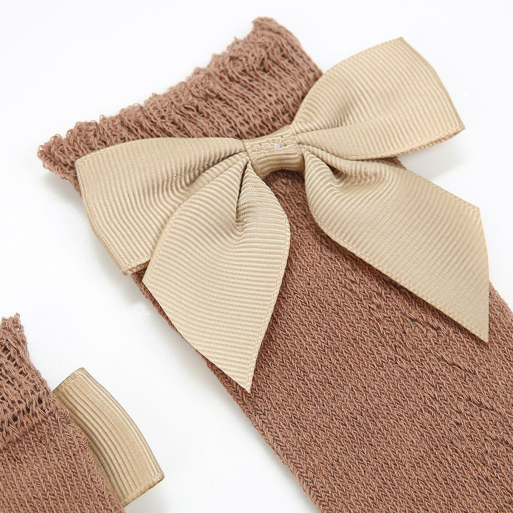 Strümpfe Lochmuster bronze Schleife braun