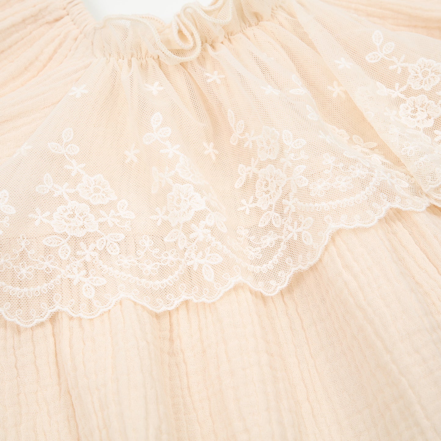 Musselinromper Spitze creme II