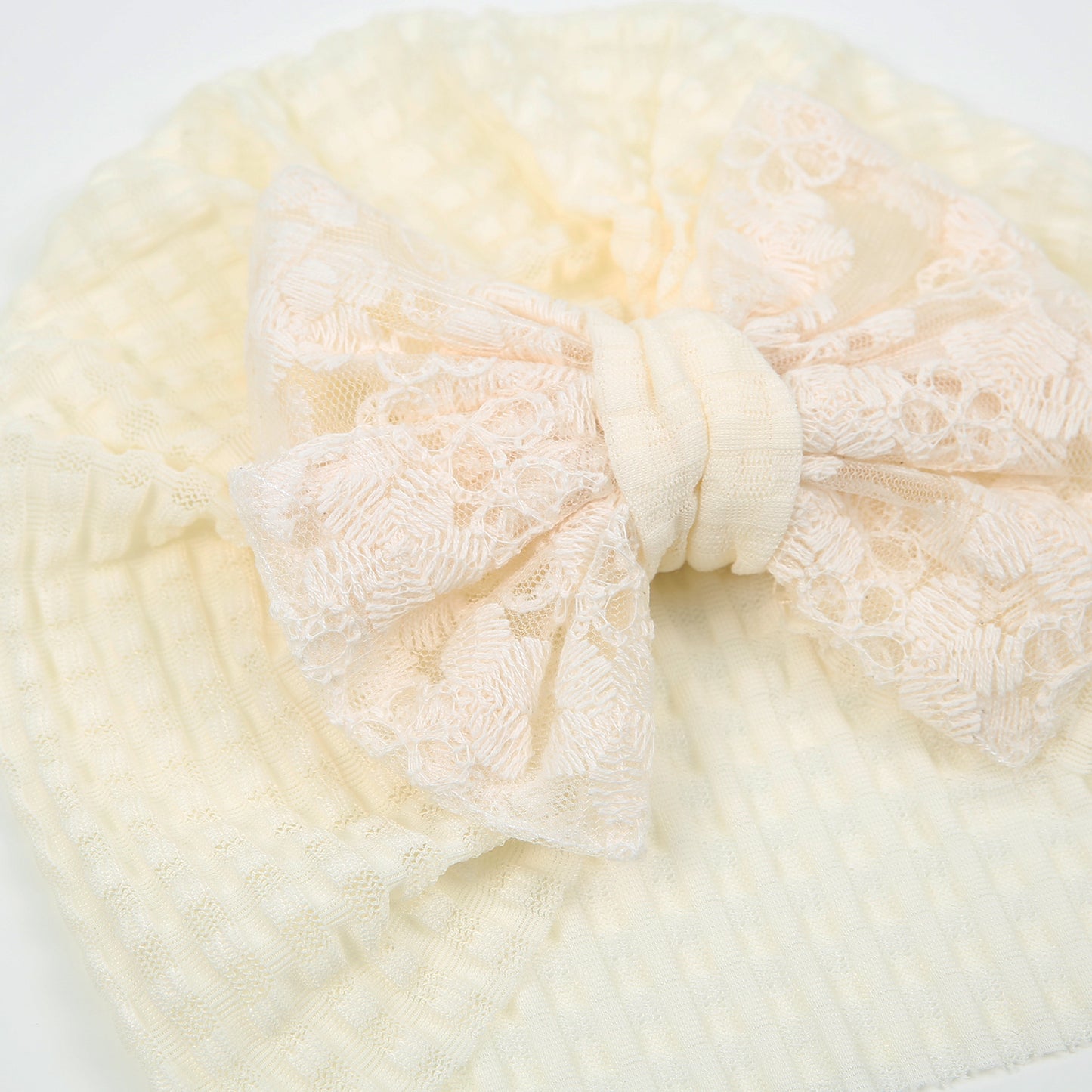Turban Waffelstruktur Spitzenschleife creme