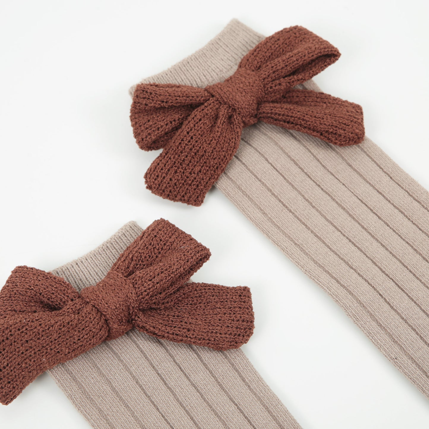 Strümpfe Wollschleife beige