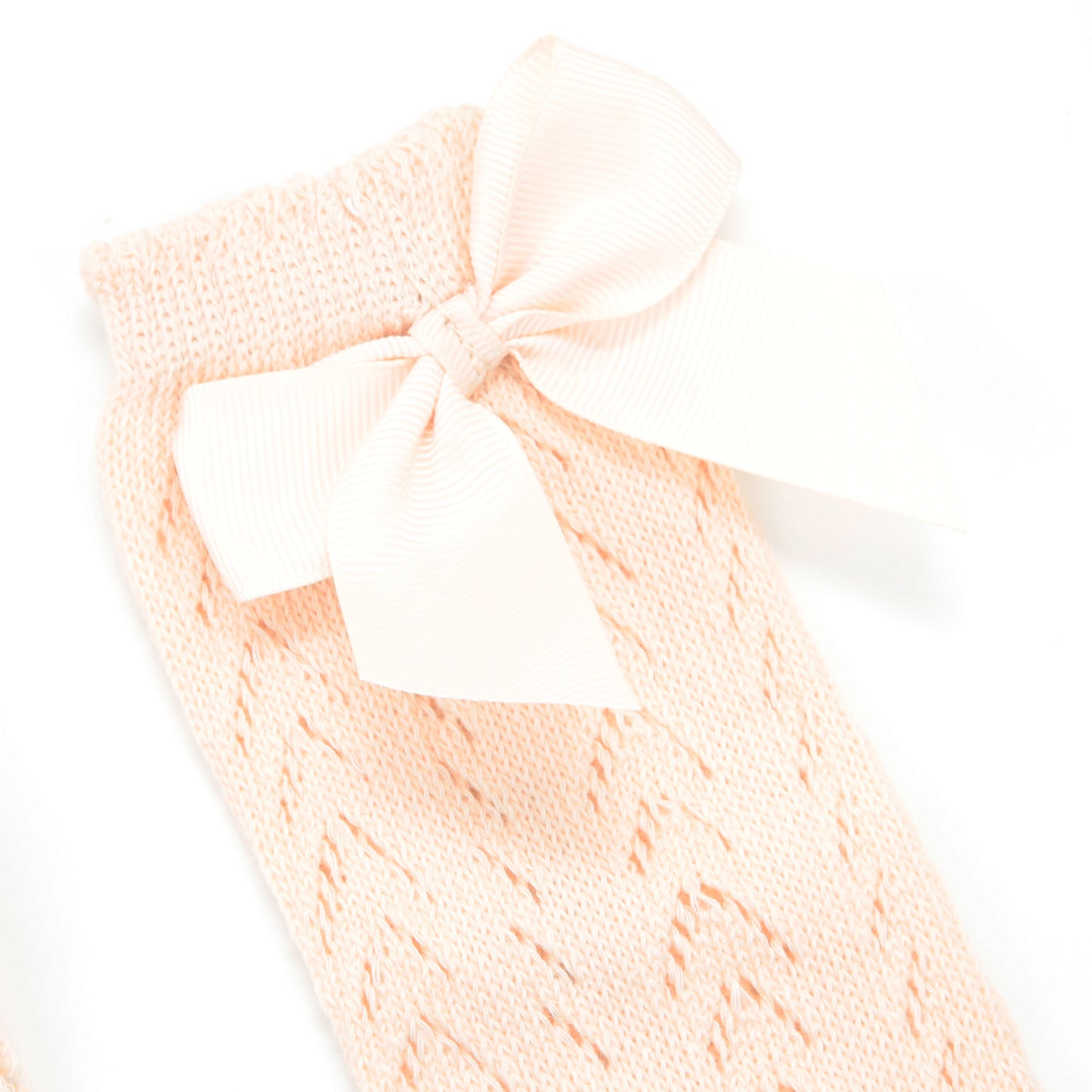 Strümpfe Lochmuster Schleife creme