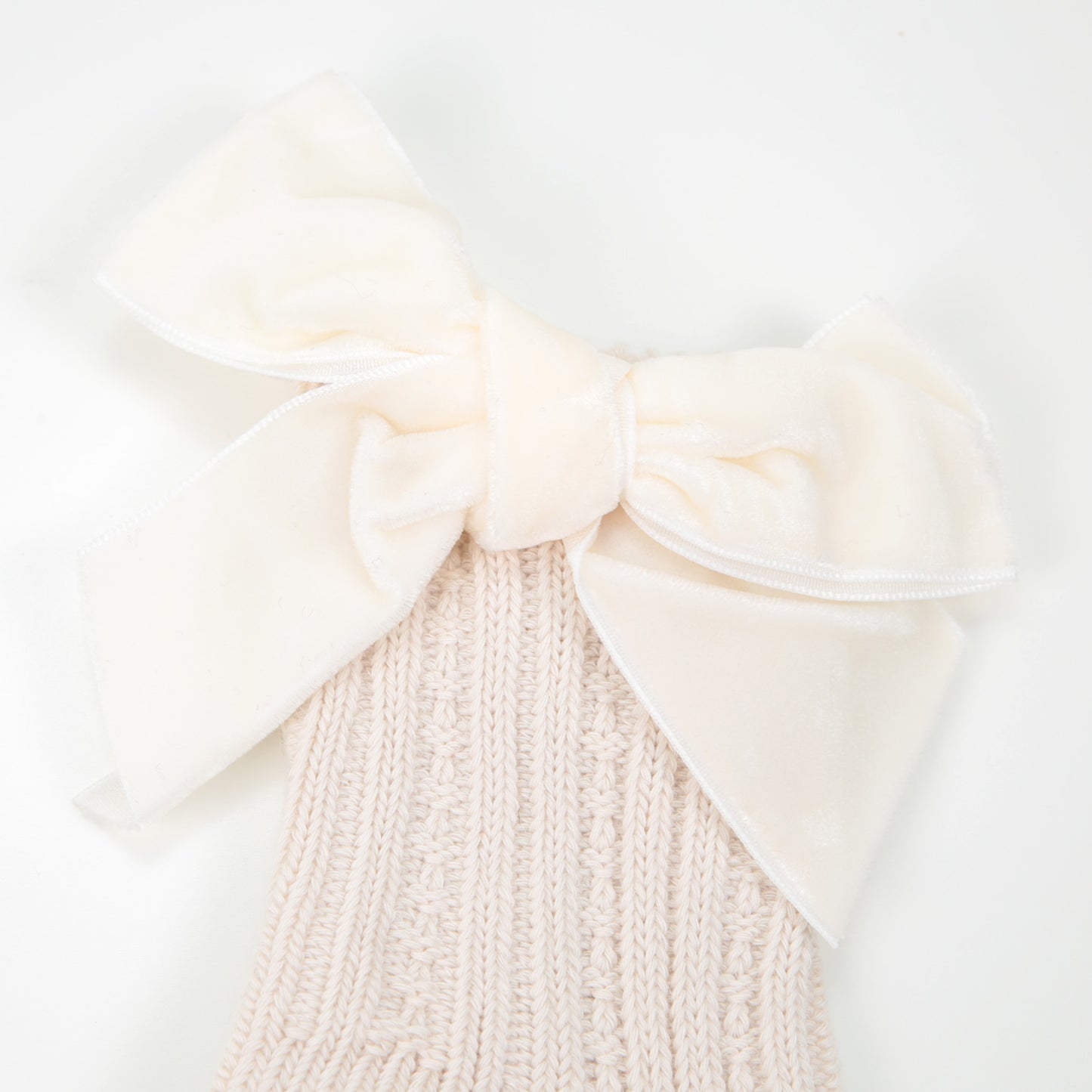 Strümpfe gerippt Samtschleife creme