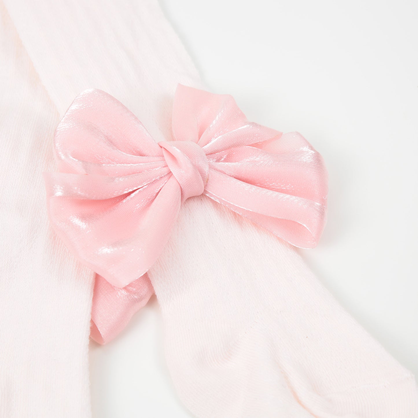 Strumpfhose Lochmuster große Satinschleife rosa